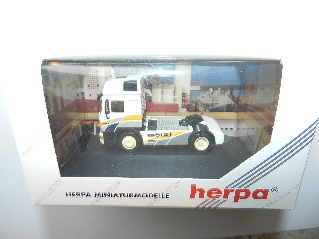 Herpa 110129 MAN tractor unit in PC box
