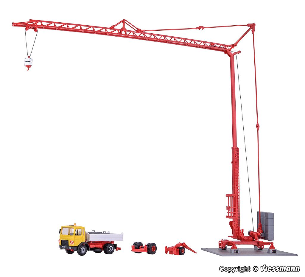 Kibri 13025 - H0 MAN tipper truck and LIEBHERR SK 20 fast-erecting crane