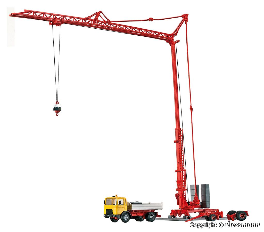 Kibri 13025 - H0 MAN tipper truck and LIEBHERR SK 20 fast-erecting crane