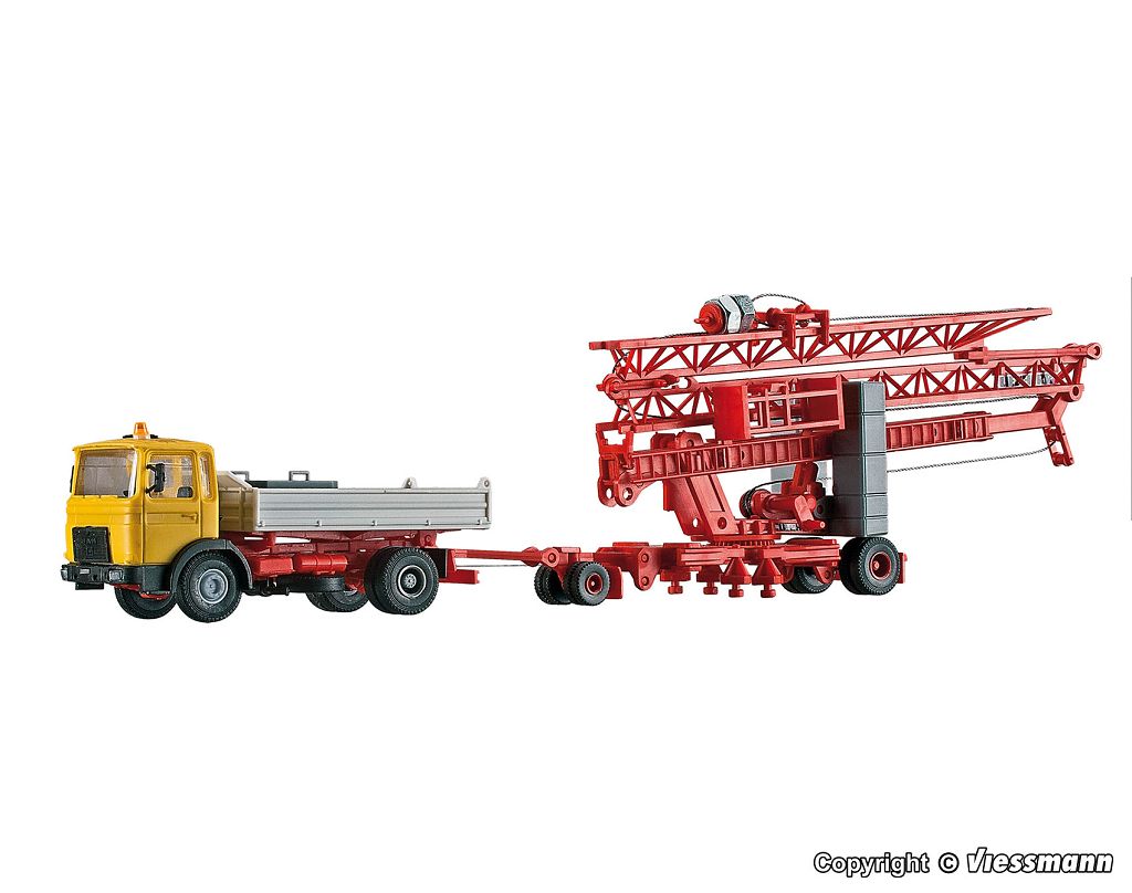 Kibri 13025 - H0 MAN tipper truck and LIEBHERR SK 20 fast-erecting crane