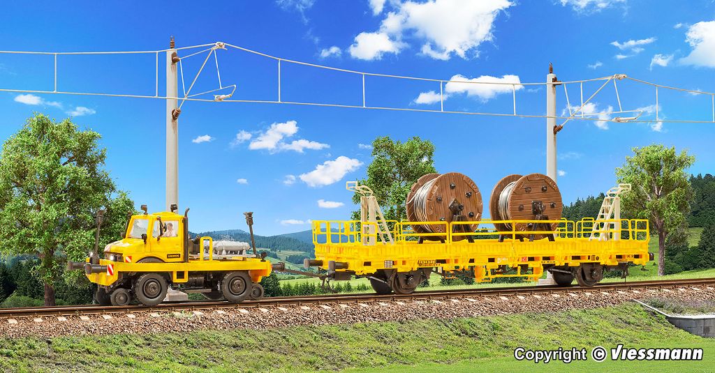 Kibri 16062 - H0 Two-way UNIMOG with pull, push frame and overhead line construction wagon